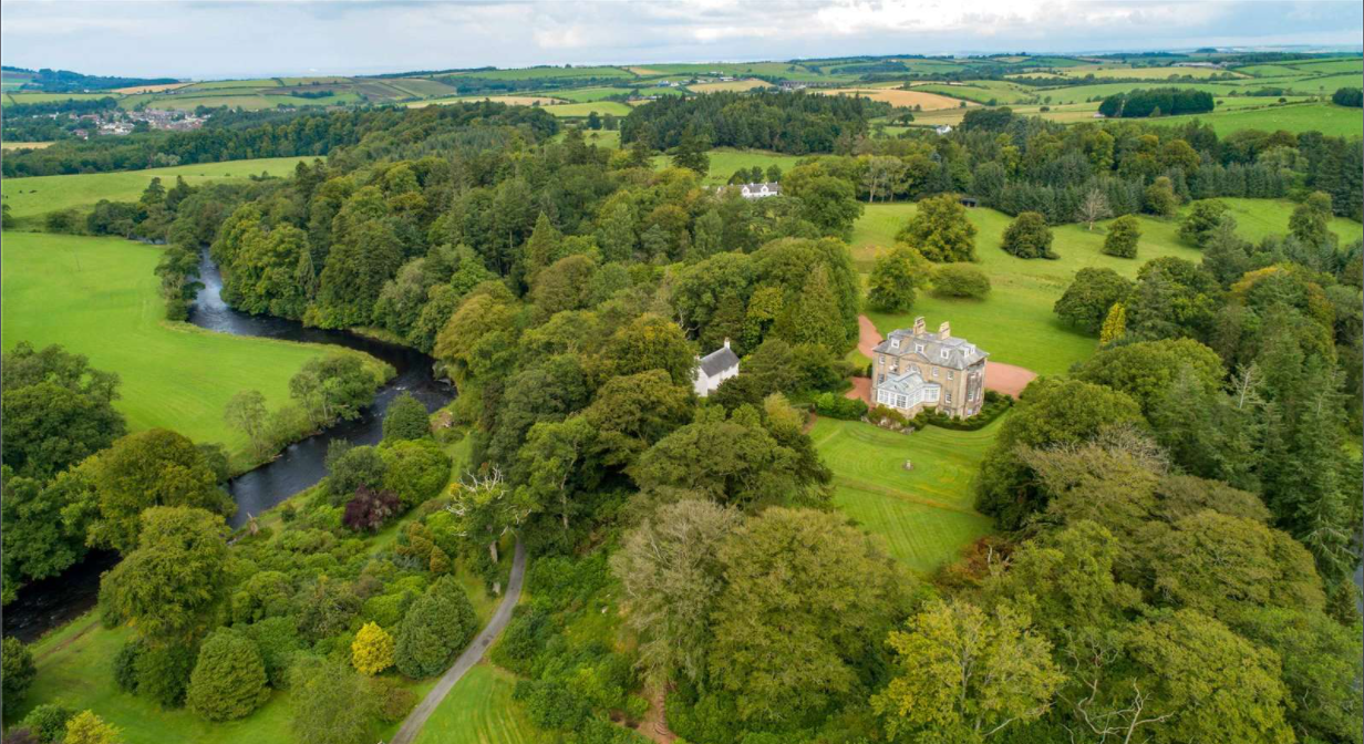 An aerial view of Skeldon House, located on the 18th-century Ayrshire estate in Scotland. — Screen capture via Savills.com