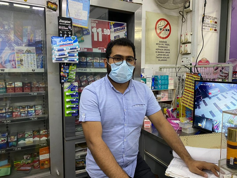 Noble Supermarket Taman Perling supervisor Mohd Asif CK says he looks forward to the reopening of the border in hopes that business will improve. — Picture by Ben Tan