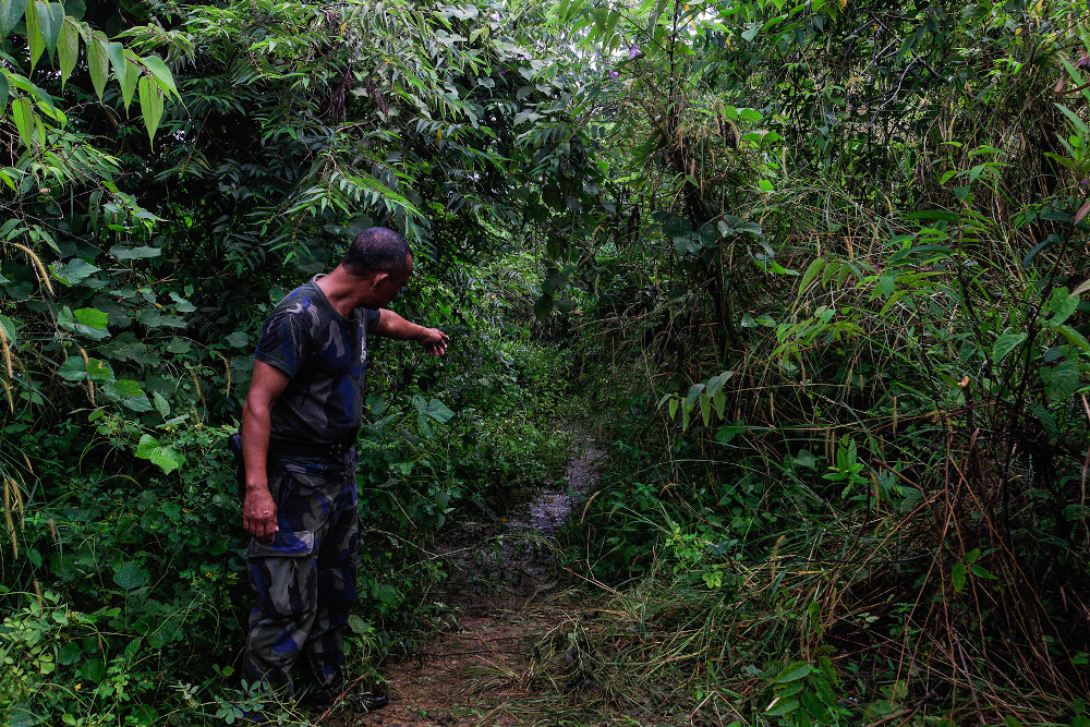 Judin Alwie, 43, one of the PGA personnel under the 3rd Battallion showing the place where the late Baharuddin Ramli`s body was found after the shootout here in Padang Besar November 24, 2020. u00e2u20acu201d Picture by Sayuti Zainudin