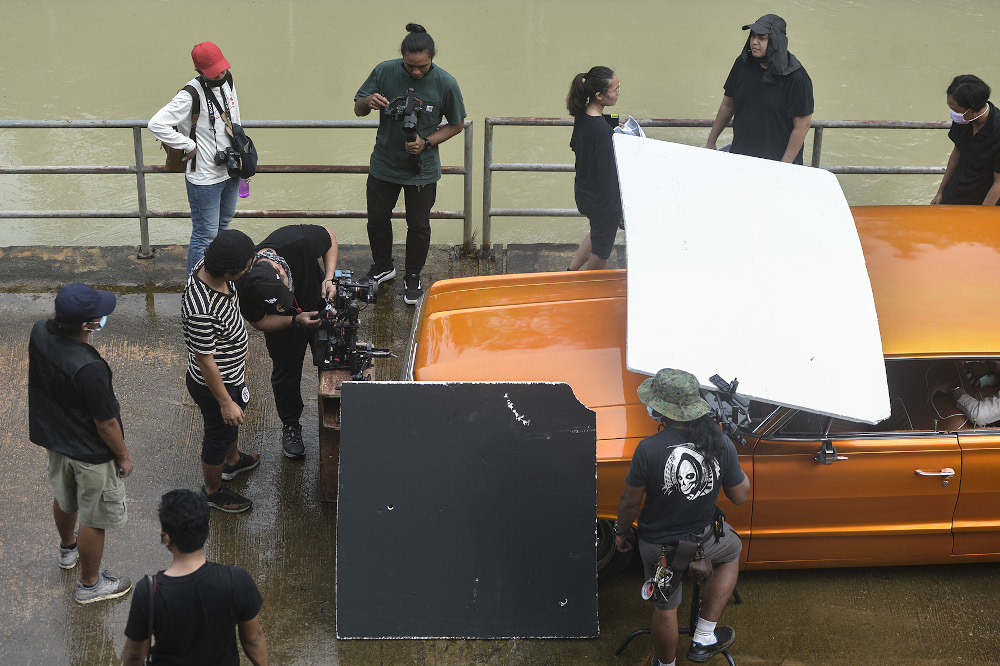 A film production crew shooting on set during the conditional movement control order (CMCO) in Shah Alam November 28, 2020. u00e2u20acu201d Picture by Miera Zulyana 
