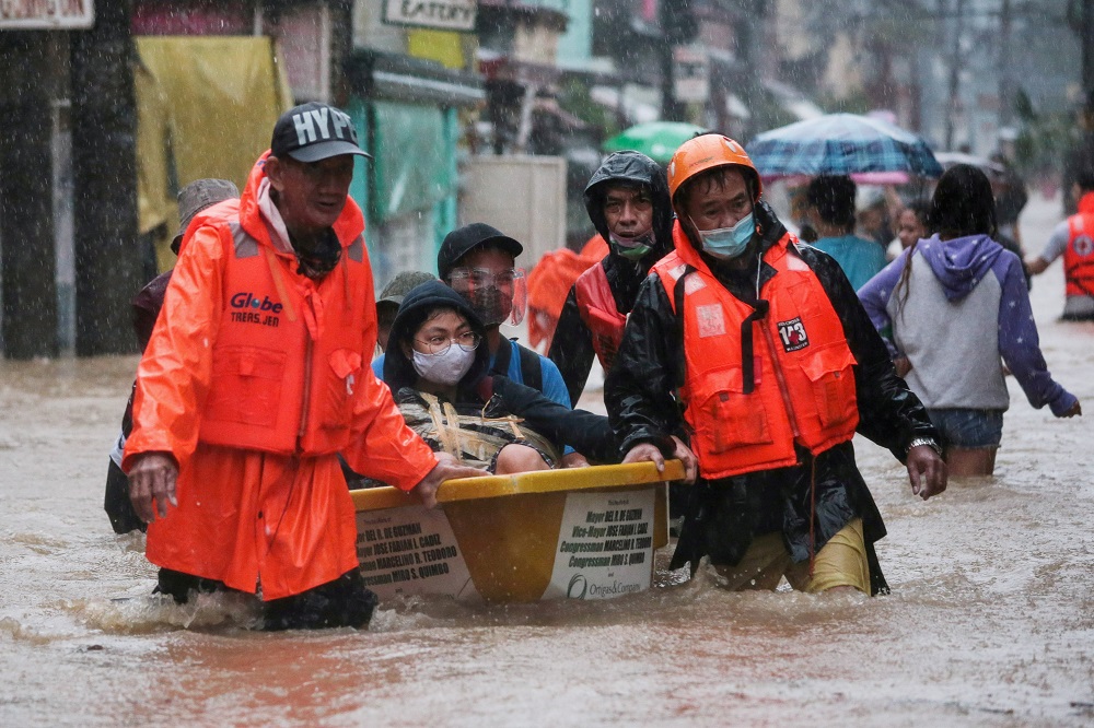 Residents affected by floods from Typhoon Vamco are rescued on a boat, at Marikina, Metro Manila, Philippines November 12, 2020. u00e2u20acu2022 Reuters pic