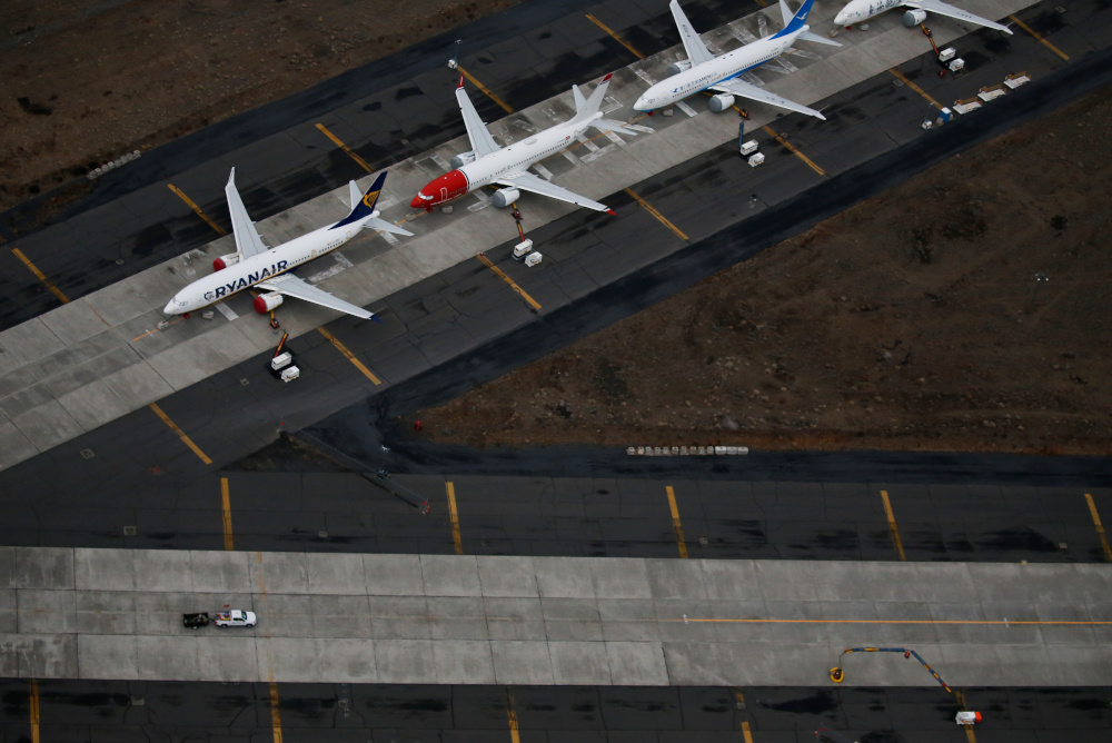 A truck drives by a line of grounded Boeing 737 MAX aircraft parked at Grant County International Airport in Moses Lake, Washington, US November 17, 2020. u00e2u20acu201d Reuters pic 