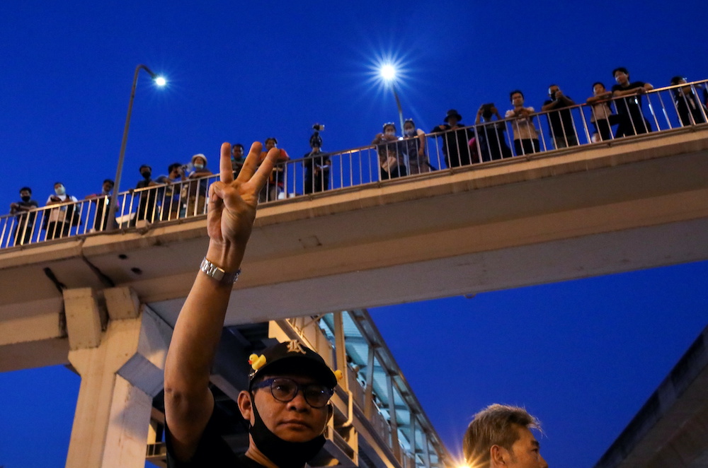 A protester shows the three-finger salute while attending a pro-democracy rally demanding the prime minister to resign and reforms on the monarchy, in Bangkok, Thailand, November 28, 2020. u00e2u20acu201d Reuters picnnn
