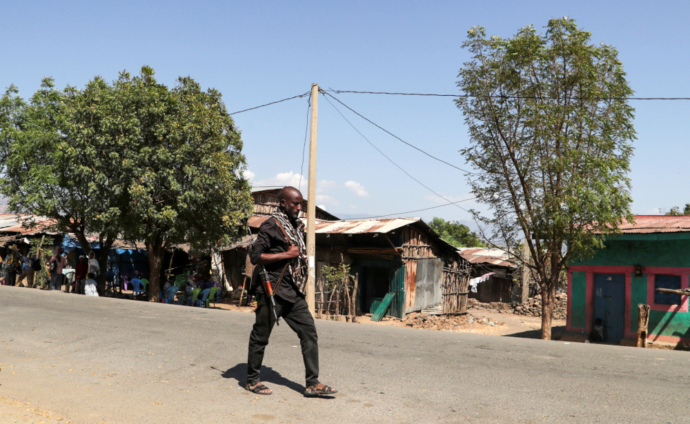 A member of the Amhara Special Force patrols a street in Soroka village in Amhara region near a border with Tigray, Ethiopia November 9, 2020. u00e2u20acu201d Reuters picnn