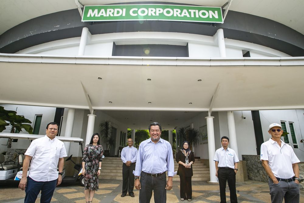From front row left to right : BoxCube Chairman Datuk Emil Rinaldi Syaiful, MardiCorp CEO Zaidi Shahrim and Ancom Crop Care CEO Anthony Tan pose for photo at Mardi Corp in Serdang November 12, 2020. u00e2u20acu201dPicture by Firdaus Latif