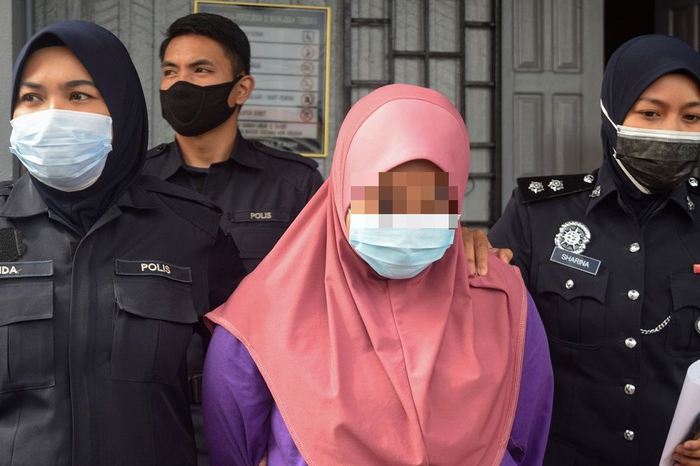 the 19-year-old suspect is led out of the court in Marang November 9, 2020. u00e2u20acu201d Bernama pic