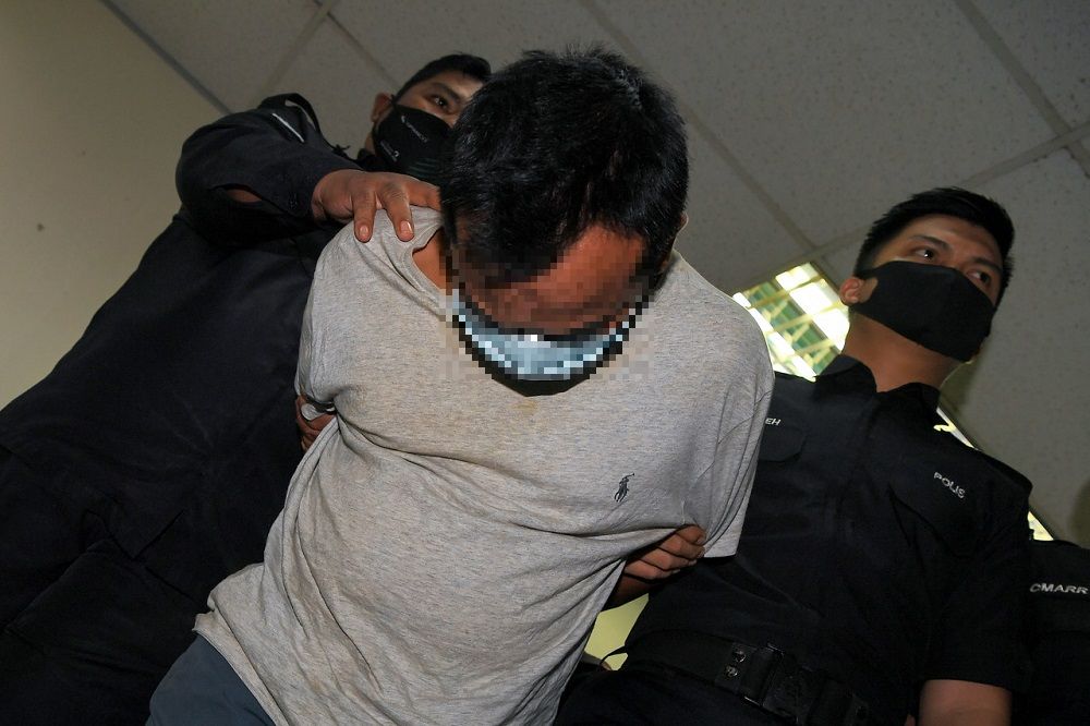 The accused is led to the Ampang Sessions Court in Kuala Lumpur November 11, 2020. u00e2u20acu201d Bernama pic