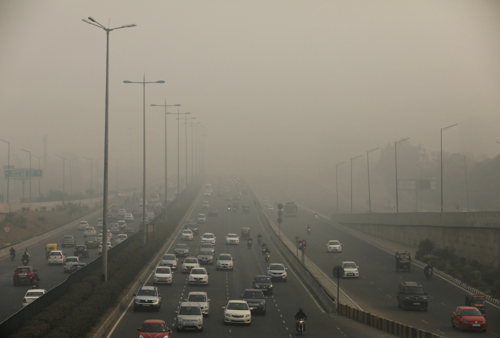 Vehicles drive through smog in Gurugram, India, November 9, 2020. u00e2u20acu201d Reuters pic