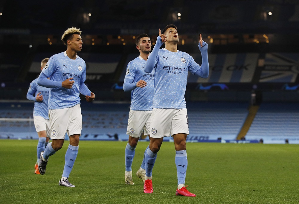 Manchester City's Joao Cancelo celebrates after scoring the third goal against Olympiakos November 4, 2020. u00e2u20acu2022 Reuters pic
