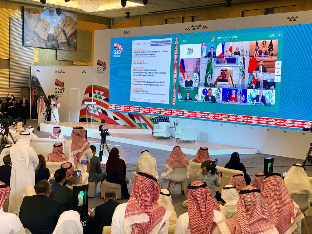 Media watches Saudi King Salman bin Abdulaziz's virtual speech live at the media centre during an opening session of the 15th annual G20 Leaders' Summit in Riyadh, Saudi Arabia November 21, 2020. u00e2u20acu201d Reuters picnn