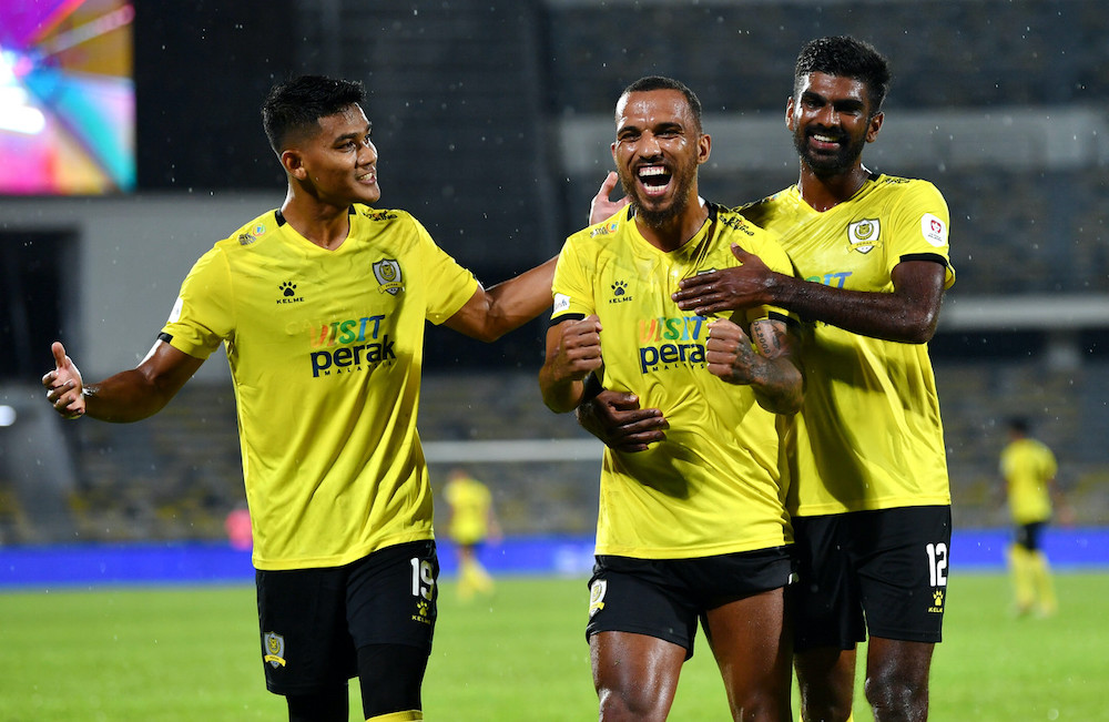 Leandro Dos Santos (centre) celebraes his goal during the match against Kelantan United FC in Perak, November 7, 2020. u00e2u20acu201d Bernama pic