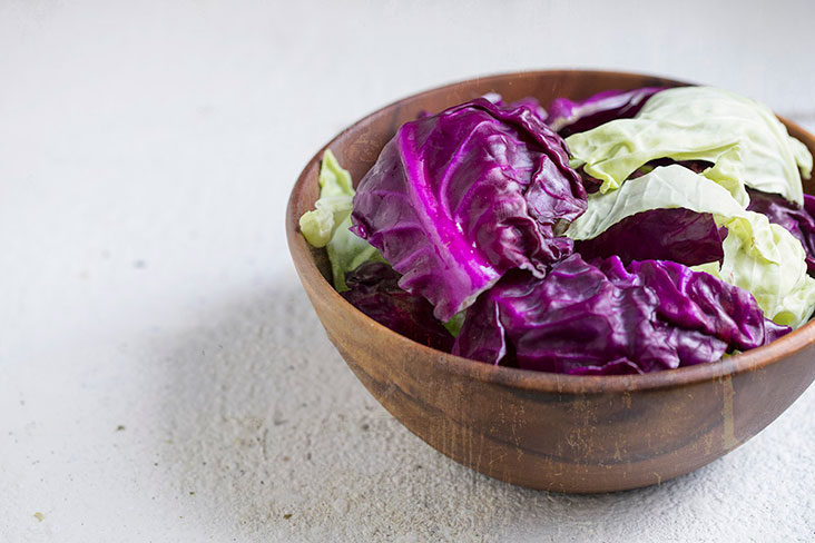 Washed cabbage leaves, drained and torn into bite-sized pieces by hand