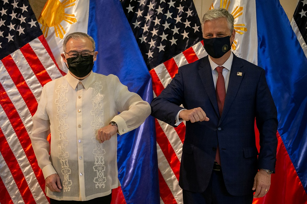US National Security Adviser Robert O'Brien and Philippines' Secretary of Foreign Affairs Teodoro Locsin Jr elbow bump after the turnover ceremony of defence articles, in Pasay City, Metro Manila, Philippines November 23, 2020. u00e2u20acu2022 Reuters pic