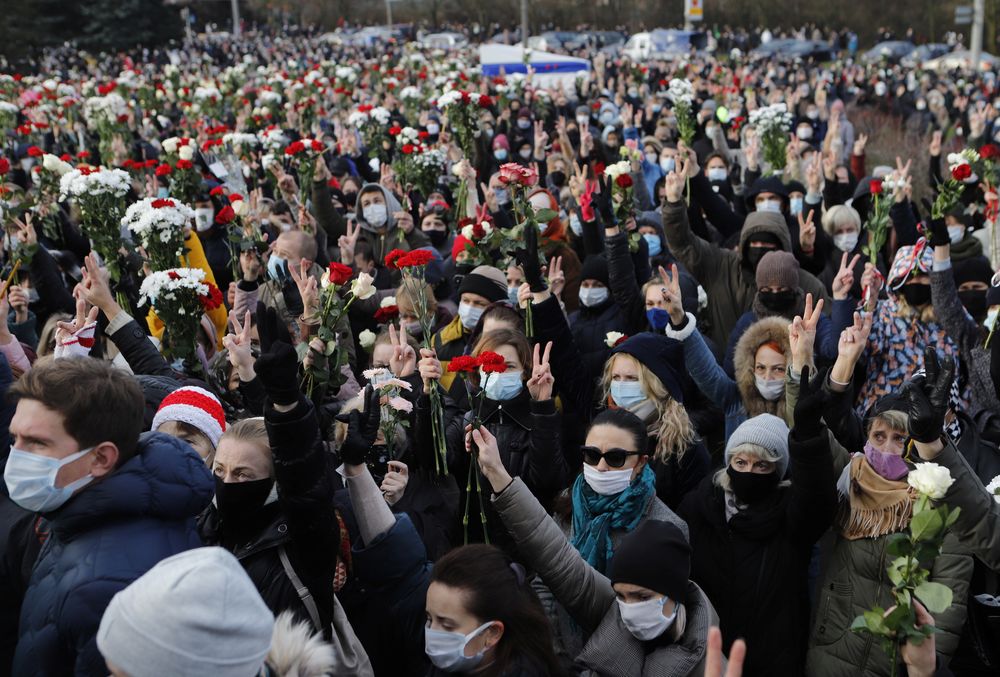 People flash the victory sign as they gather outside a church during a memorial service for Roman Bondarenko, an anti-government protester who died in hospital, in Minsk, Belarus, November 20, 2020. u00e2u20acu201d Reuters pic