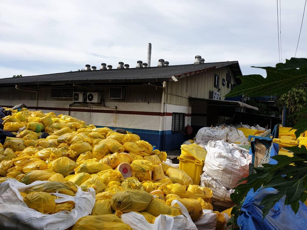 Piled up medical waste outside the Sedafiat waste management firm's compound in Lok Kawi, Sabah has created concern among members of the publicn