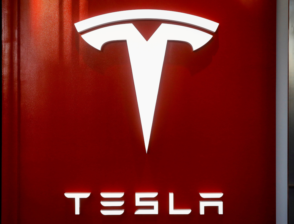 The Tesla logo is seen at the entrance to Tesla Motors' showroom in Manhattan's Meatpacking District in New York City, US, December 14, 2017. u00e2u20acu201d Reuters picnn
