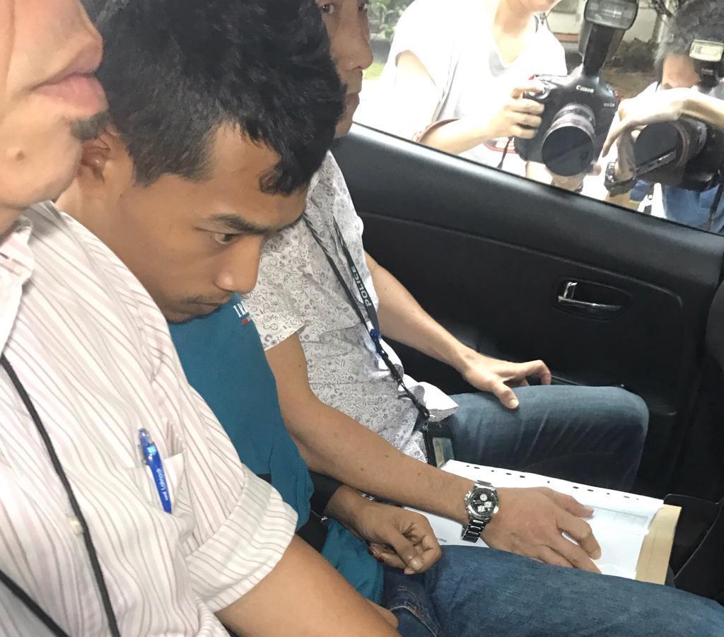 Ahmad Muin Yaacob (centre) was sentenced to life in jail and 18 strokes of the cane for killing his work supervisor in 2016. u00e2u20acu2022 TODAY file pic