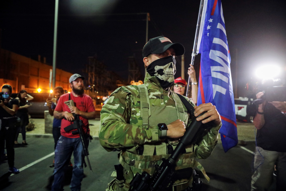 Trump supporters carry semi-automatic rifles as they protest about the early results of the 2020 presidential election, in front of the Maricopa County Tabulation and Election Center in Phoenix, Arizona, November 5, 2020. u00e2u20acu201d Reuters pic 