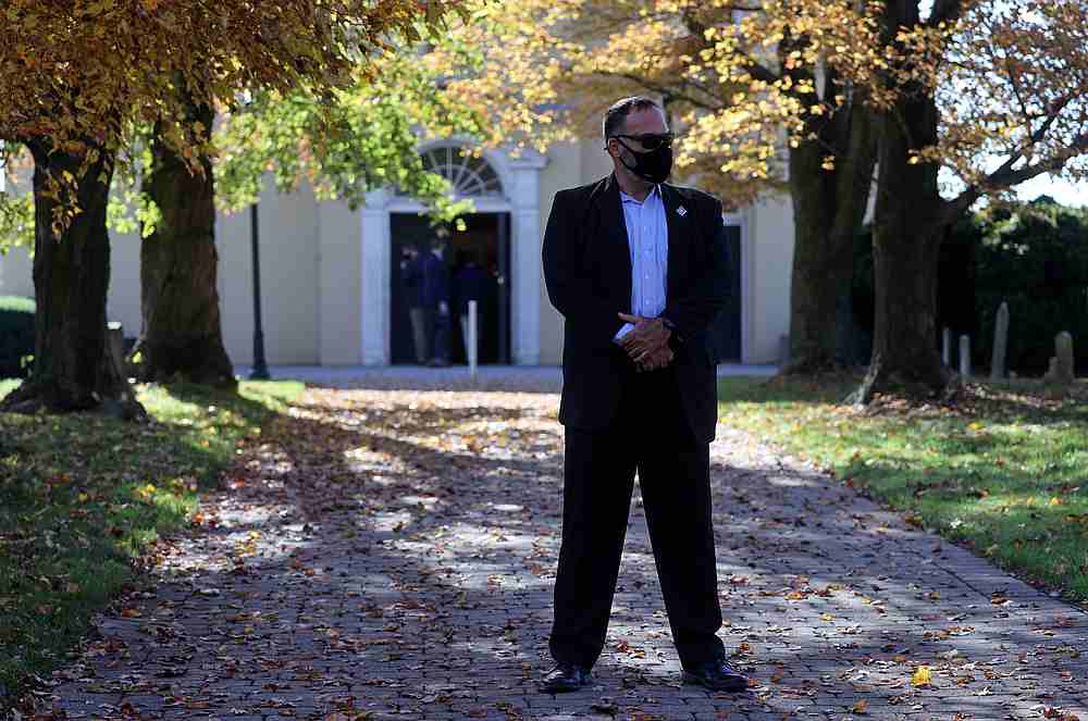 A US Secret Service agent stands guard outside the church where US President-elect Joe Biden is attending a service, in Wilmington, Delaware November 8, 2020. u00e2u20acu201d Reuters pic
