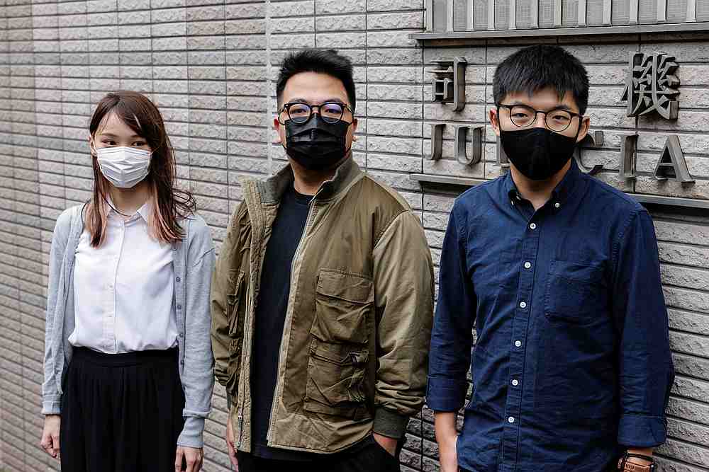 Pro-democracy activists (from left) Agnes Chow, Ivan Lam and Joshua Wong and arrive at the West Kowloon Magistrates' Courts in Hong Kong November 23, 2020. u00e2u20acu201du00e2u20acu201d Reuters pic 