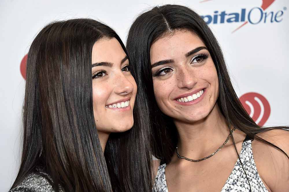 Charli D'Amelio (left) has helped her sister Dixie (right) reach over 93 million views on YouTube with her video 'Be Happy.' u00e2u20acu201d AFP pic