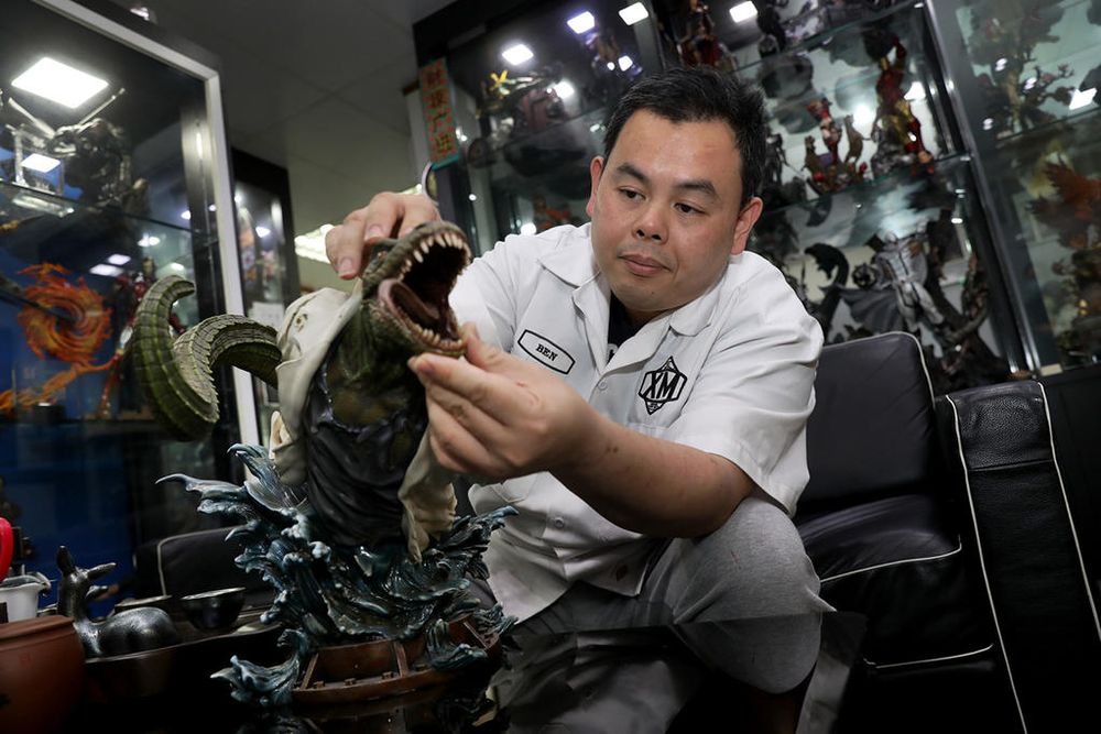Ben Ang, chief executive officer of XM Studios, with one of the collectibles that the firm sells around the globe. u00e2u20acu201d TODAY pic