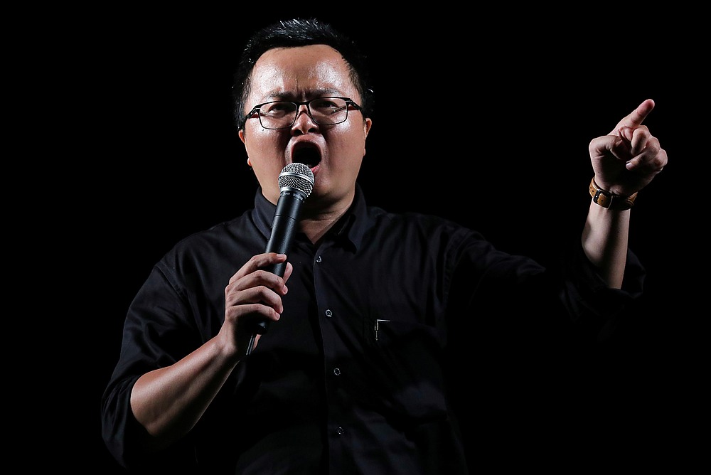 Human rights lawyer Arnon Nampa speaks during a Thai anti-government mass protest, on the 47th anniversary of the 1973 student uprising, in Bangkok, Thailand October 14, 2020. u00e2u20acu201d Reuters pic