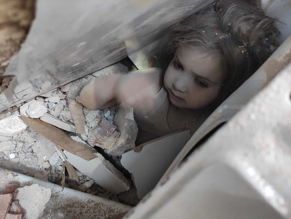 Ayda Gezgin lifts her arm from the rubble of a collapsed building after an earthquake in the Aegean port city of Izmir, Turkey November 3, 2020. u00e2u20acu201d Jak/Turkish Interior Ministry handout via Reuters