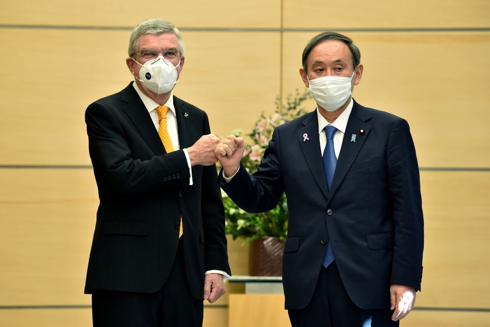 Japanu00e2u20acu2122s Prime Minister Yoshihide Suga (right) greets International Olympic Committee president Thomas Bach during their meeting in Tokyo on November 16, 2020. u00e2u20acu201d Reuters pic