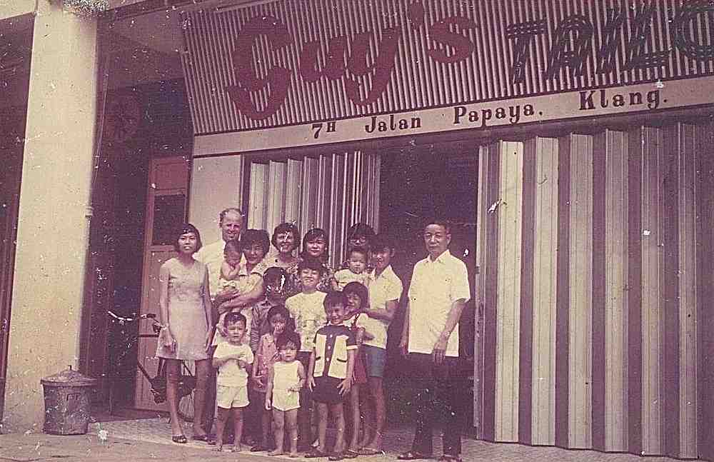 First generation tailor Lim Lam (far right) outside former Lim Lam Tailor Shop in Seri Intan, Klang before the shop was relocated to Pasar Besar Meru. — Picture courtesy of Agnes Aui