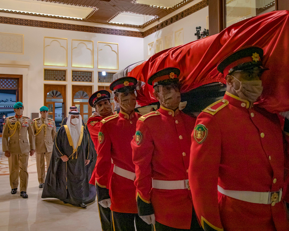 A handout picture released by Bahrain’s official news agency (BNA) November 12, 2020, shows Bahrain’s King Hamad bin Isa Al-Khalifa following the casket of Bahrain’s Prince Khalifa bin Salman al-Khalifa upon his arrival in the capital Manama ahead of his funeral. — BNA handout pic via AFP