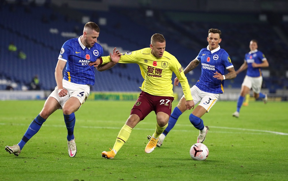 Burnley's Matej Vydra in action with Brighton & Hove Albion's Adam Webster, November 7, 2020. u00e2u20acu2022 Pool via Reuters