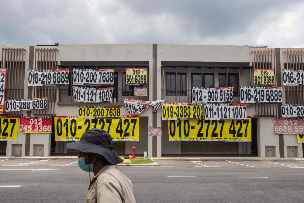 Banners displaying information on properties for rent and for sale are displayed at a commercial lot in Bandar Tropicana Aman, Selangor November 6, 2020. u00e2u20acu201d Picture by Firdaus Latif