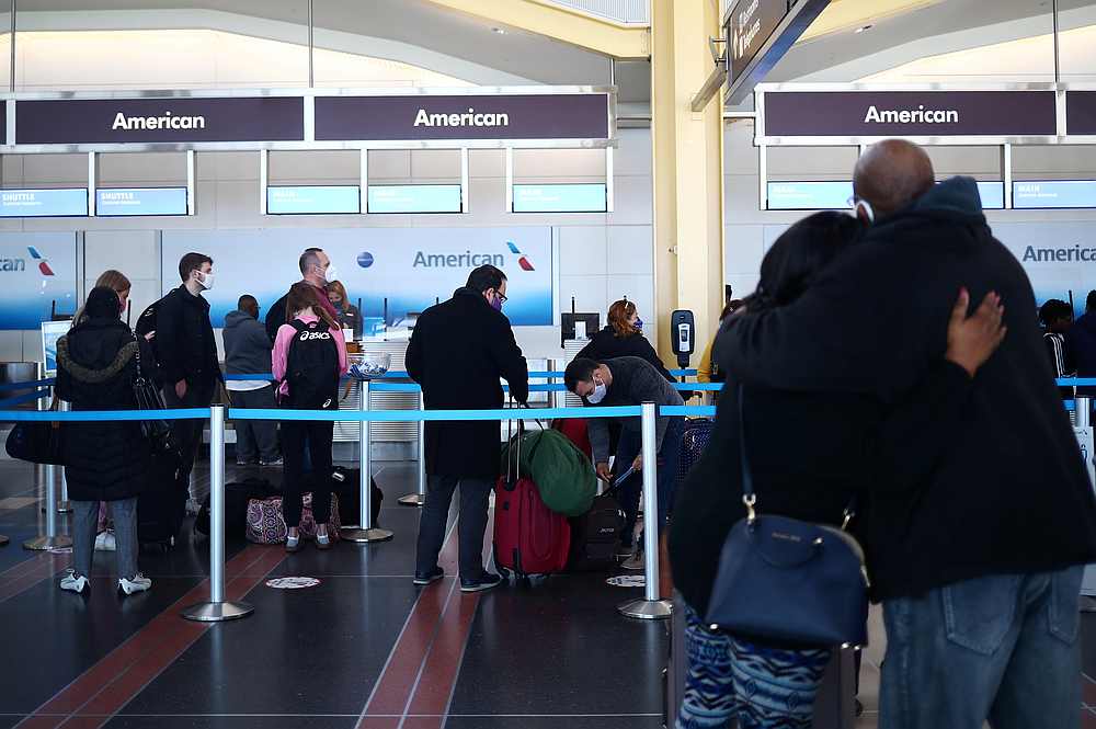 People queue at Reagan National Airport ahead of the Thanksgiving holiday in Arlington November 25, 2020. u00e2u20acu201d Reuters pic