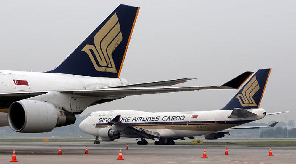 Singapore Airlines Group says increased cargo services is one way it can offset heavy losses on passenger routes. u00e2u20acu201d Reuters pic