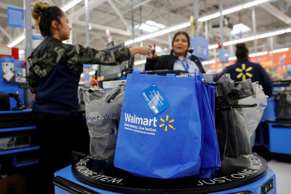 A customer pays for her groceries after shopping at a Walmart store ahead of the Thanksgiving holiday in Chicago, Illinois, US, November 27, 2019. u00e2u20acu201d Reuters pic