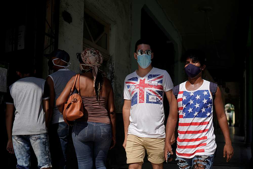 People wear T-shirts with Union Jack and a US flag in downtown Havana, Cuba October 31, 2020.u00e2u20acu201d Reuters pic