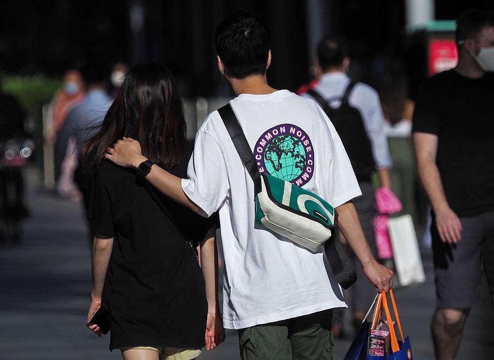 In a recent survey, just about one in four Singaporean women say they would date a man who earns less than them. u00e2u20acu201d TODAY pic