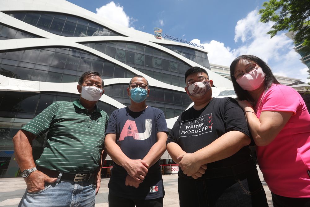 Former Yaohan staff (from left) Leslie Ee (financial controller); Richard Or (baker), Adrian Png (human resources) and Jenny Gan (cashier), photographed in front of Plaza Singapura, where a Yaohan outlet was once located. — TODAY pic