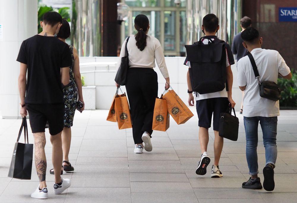 A survey found that close to 6 in 10 Singaporean millennials prefer shopping at a physical store. — TODAY pic
