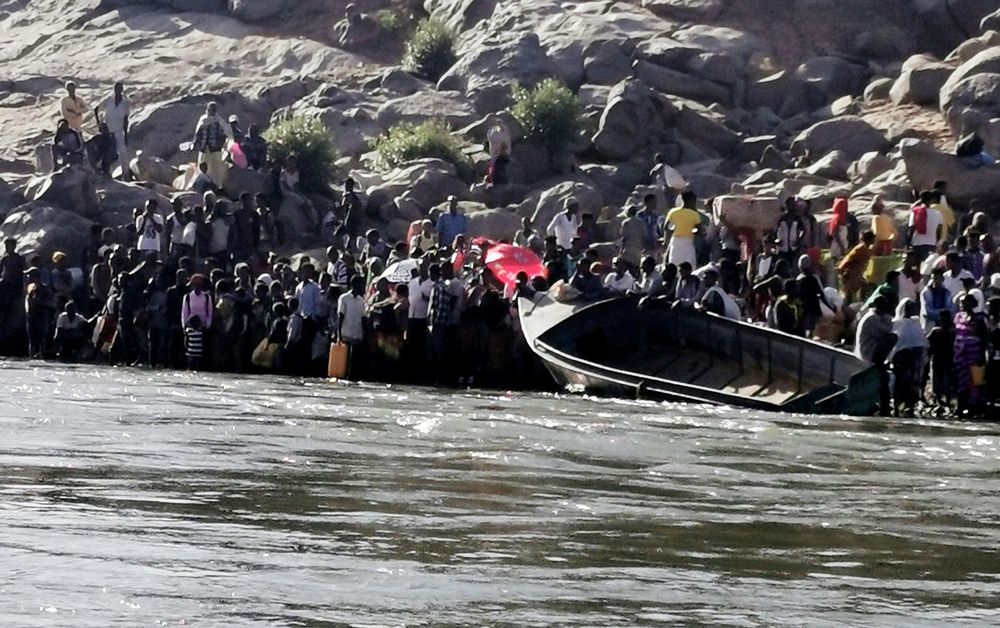 Ethiopians who fled the ongoing fighting in Tigray region prepare to cross the Setit River on the Sudan-Ethiopia border in Hamdait village in eastern Kassala state, Sudan, November 14, 2020. u00e2u20acu201d Reuters pic