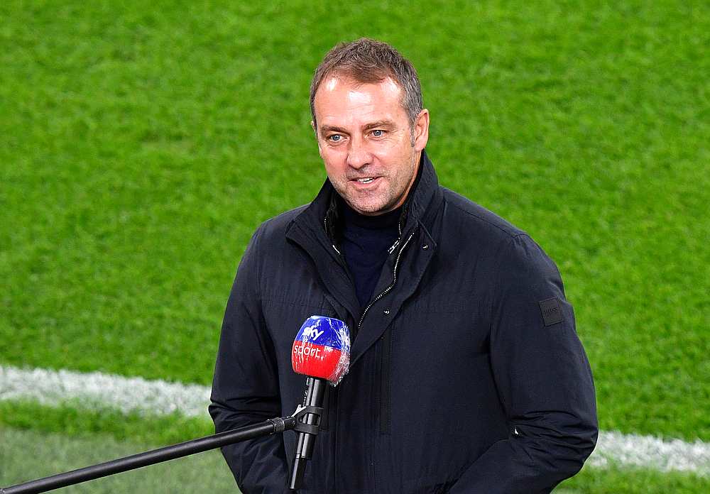 Bayern Munich coach Hansi Flick being interviewed on the pitch at Signal Iduna Park, Dortmund, Germany November 7, 2020 u00e2u20acu201d Pool pic via Reuters