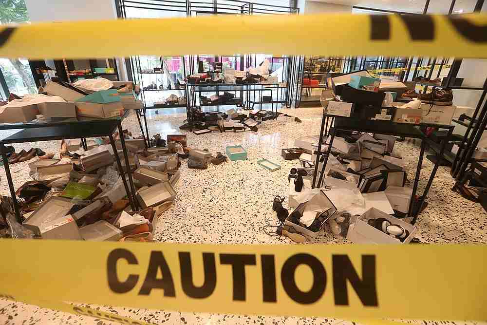 At The Heeren, Singapore on November 1, 2020, a section was cordoned off with shoes and boxes strewn on the ground and on the tables. u00e2u20acu201d TODAY pic