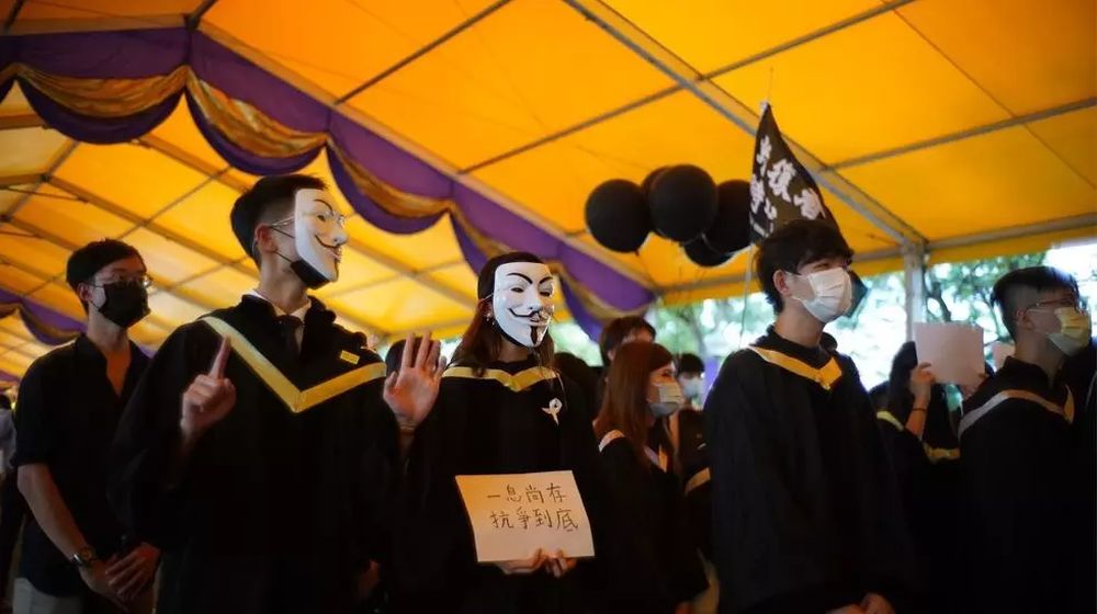 The Chinese University of Hong Kong (CUHK) students donned face masks to display outlawed slogans and defy the new national security law imposed by Beijing. u00e2u20acu201d AFP pic