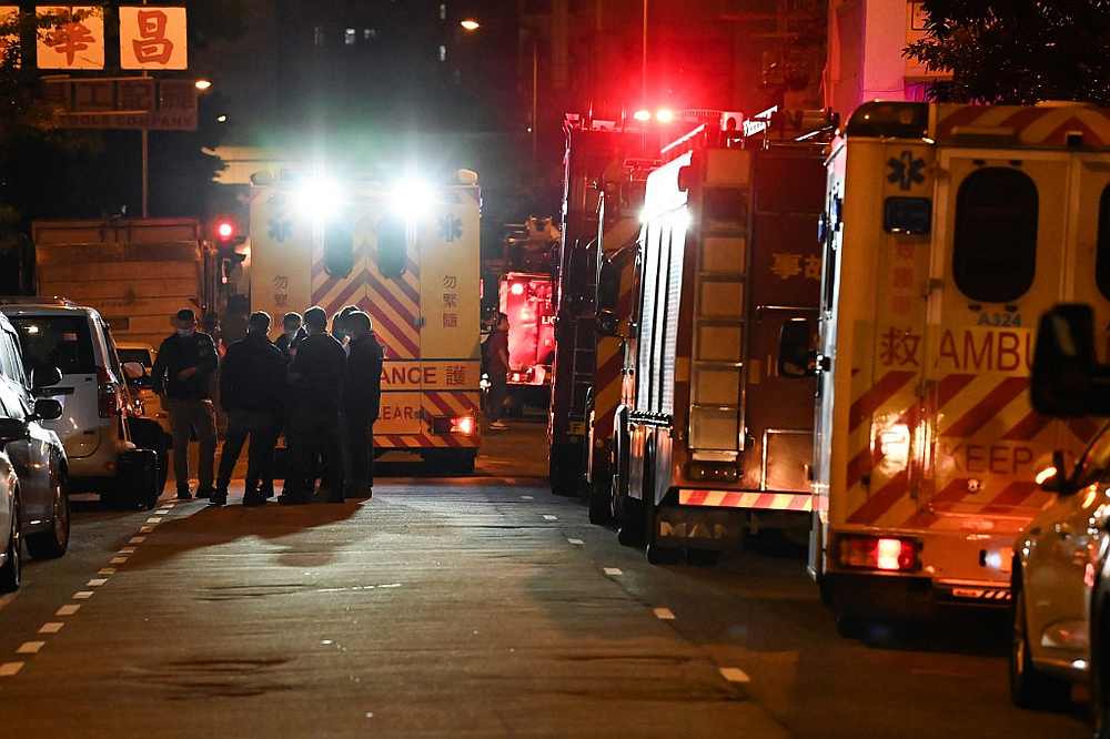 Police officers work next to a firefighter truck at the location of a fire in Hong Kong November 16, 2020. u00e2u20acu201d AFP pic
