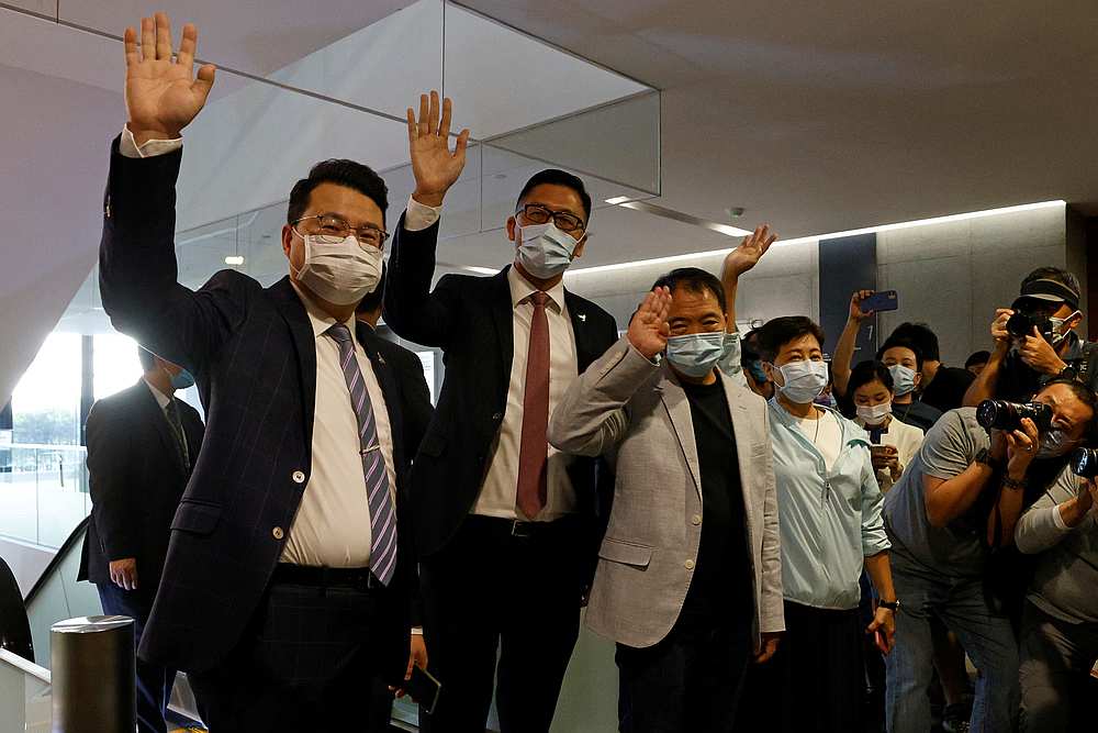 Pro-democracy legislators (from left) Wu Chi-wai, Andrew Wan and Lam Cheuk-ting wave to media after handing in their resignation letters in Hong Kong November 12, 2020. u00e2u20acu201d Reuters pic