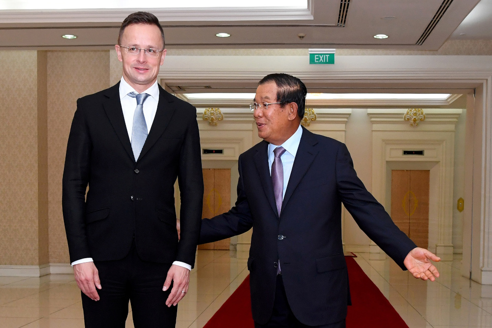 This photo taken November 3, 2020 shows Cambodia's Prime Minister Hun Sen welcoming Hungaryu00e2u20acu2122s Foreign Minister Peter Szijjarto during a meeting at the Peace Palace in Phnom Penh. u00e2u20acu201d AFP pic 