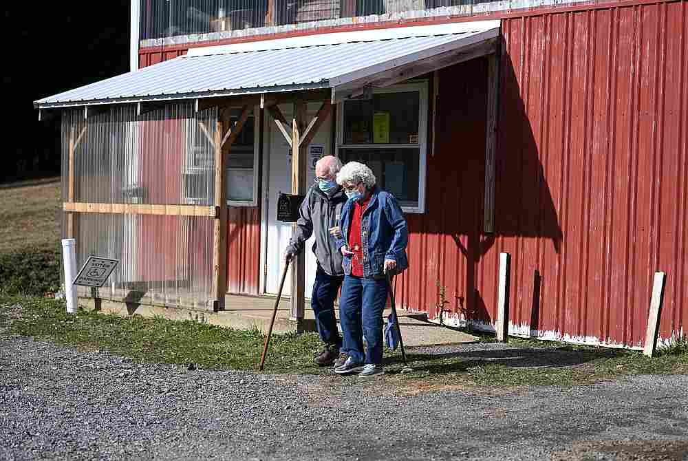 Andrew and Nancy Freno emerge from a polling place after casting their votes on Election Day, in Gypsy, Indiana County, Pennsylvania November 3, 2020. u00e2u20acu201d Reuters pic