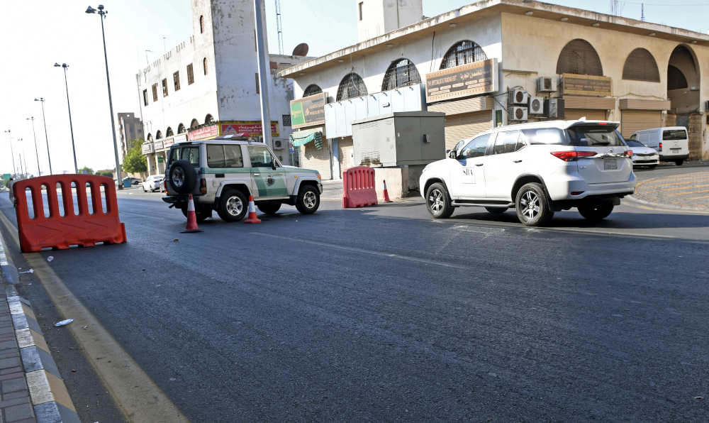 Saudi police close a street leading to a non-Muslim cemetery in the Saudi city of Jeddah where a bomb struck a World War I commemoration attended by European diplomats November 11, 2020. u00e2u20acu201d AFP pic 