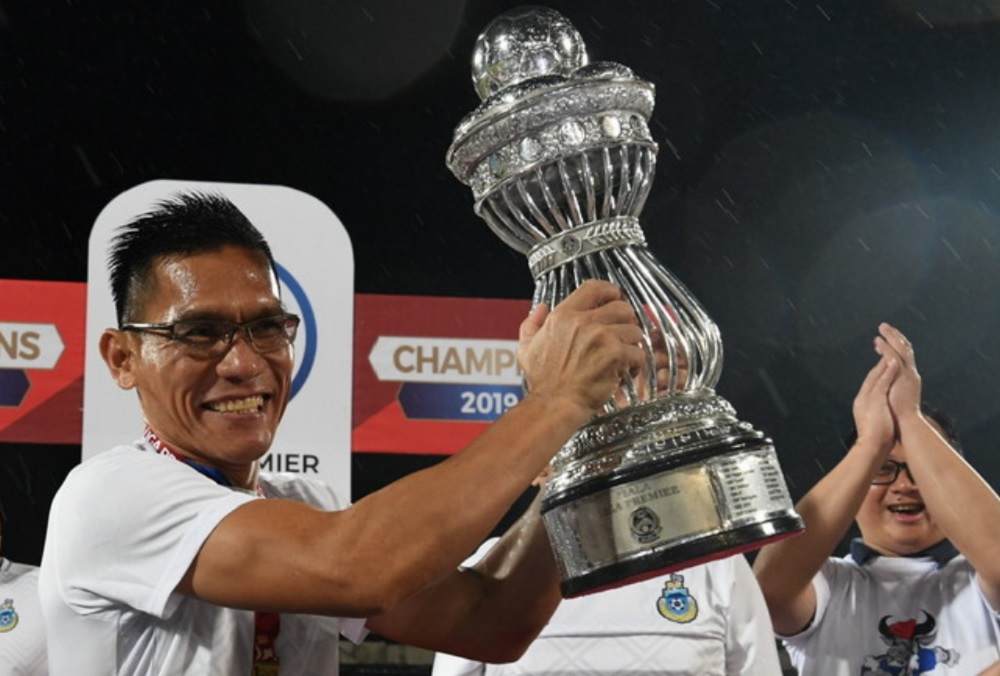 Sabah chief coach Jelius Ating holds Malaysia Premier League Cup trophy after the win at Lika Stadium July 14, 2019. u00e2u20acu201d Bernama pic 